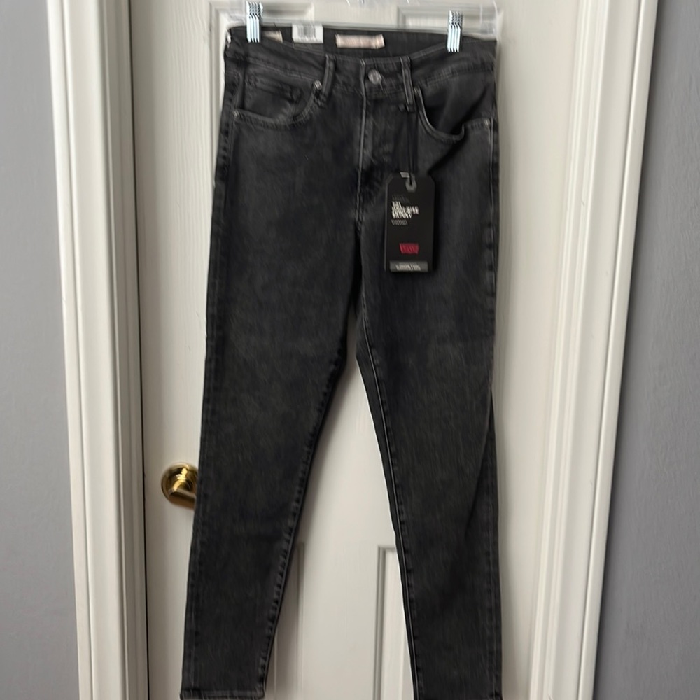 Levi’s 721 high-rice skinny faded black jeans size 27